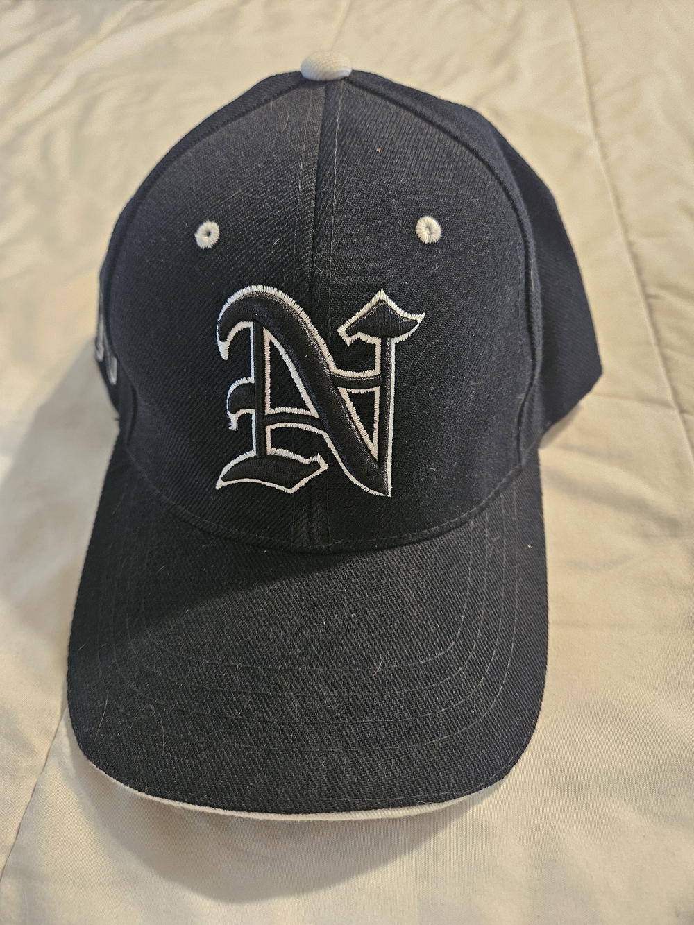N Black Baseball Cap with White Embroidered 'N'